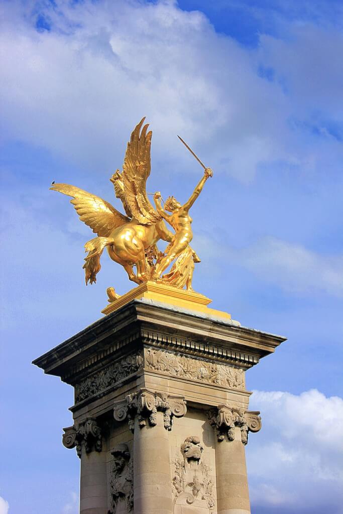 golden statue of warrior and pegasus